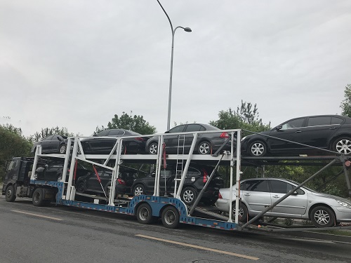 北京到盘锦托运汽车700公里多少钱_